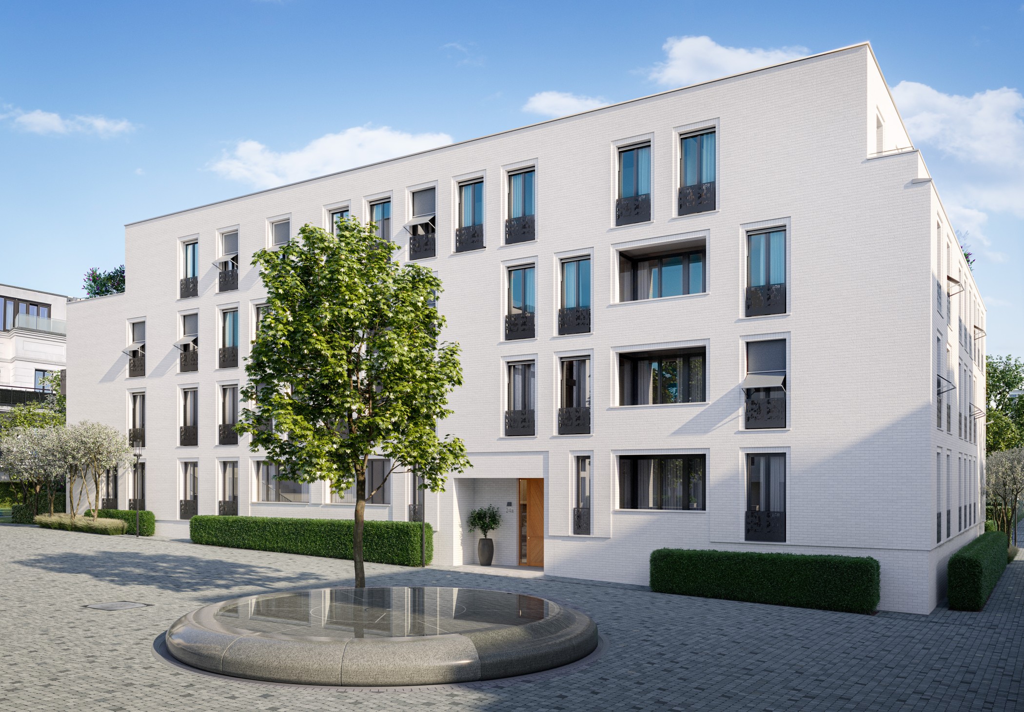 Visualisierung der Sophie bei Tag mit Eingang, rundem Brunnen mit Baum und gepflastertem Vorplatz